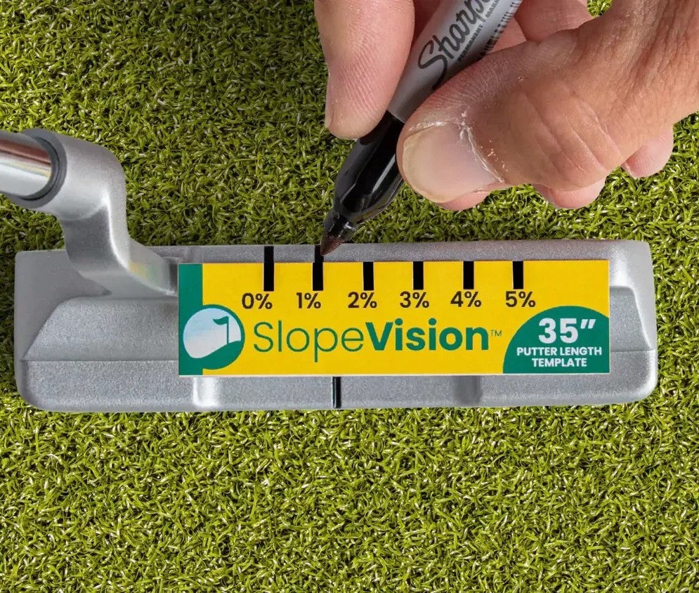 Hand marking Slope % at 1% with a sharpie on a putter